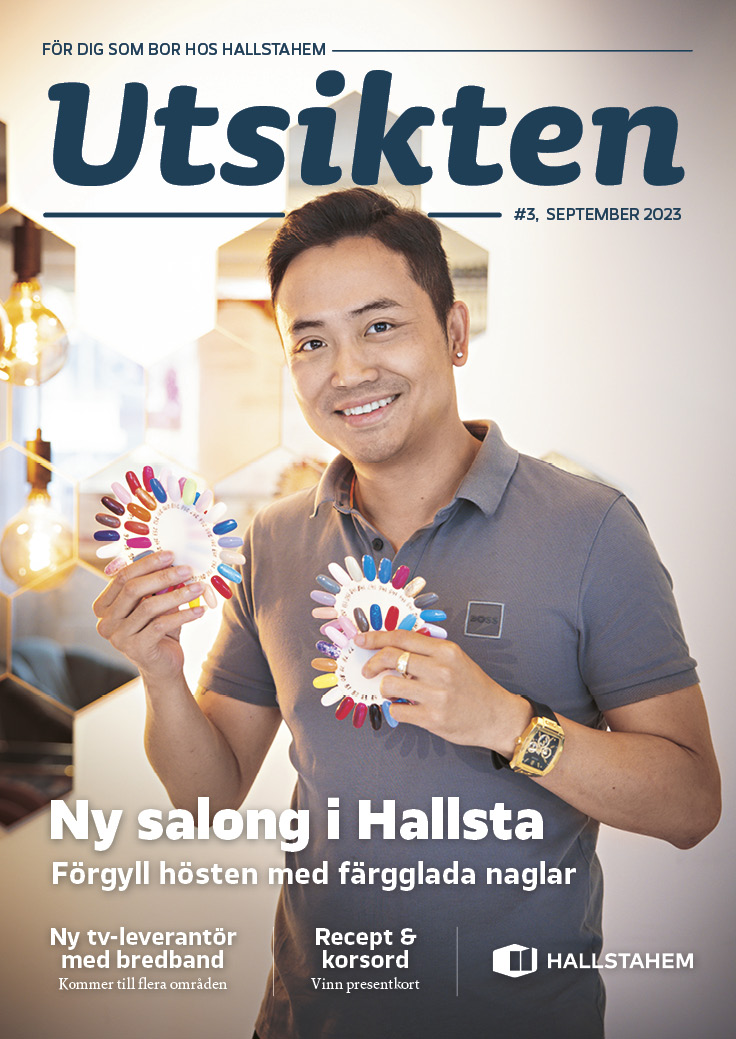 Glad kille som håller i lösnaglar för omslagsbild till tidningen Utsikten